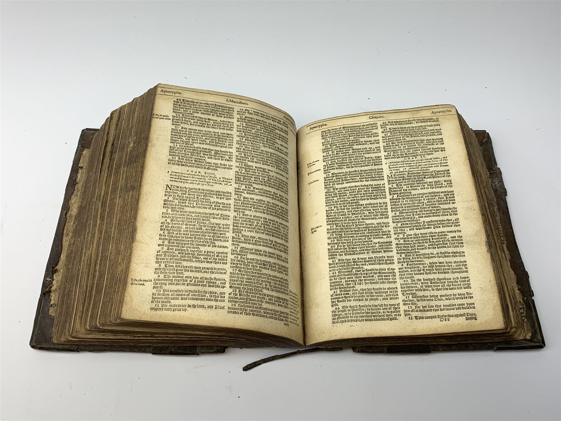 The Holy Bible, Containing the Old Testament and the New; Newly Translated out of the Originall Tongues ..., Imprinted at London by Bonham Norton and John Bill 1620. General and New Testament titles with woodcut border (New Testament title and colophon dated 1621), genealogies and double page map by J.S. (John Speed), Apochrypha present, bound with Two Right Profitable and Fruitfull Concordances .... Collected by R.F.H. Imprinted at London Bonham Norton and John Bill 1622, bound with The Whole Booke of Psalmes Collected into English Meeter by Thomas Sternehold, John Hopkins, and Others ..., printed for the Company of Stationers 1623. Full calf binding with bronze bosses.