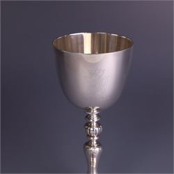 Late 20th century limited edition silver goblet, produced by Garrard & Co Ltd  to commemorate the silver wedding anniversary of Her Majesty Queen Elizabeth II and His Royal Highness the Duke of Edinburgh, the bowl engraved with Royal cyphers and anniversary dates, upon a knopped stem and embossed foot, no. 77/2000, hallmarked Garrard & Co Ltd, London 1972, H15cm