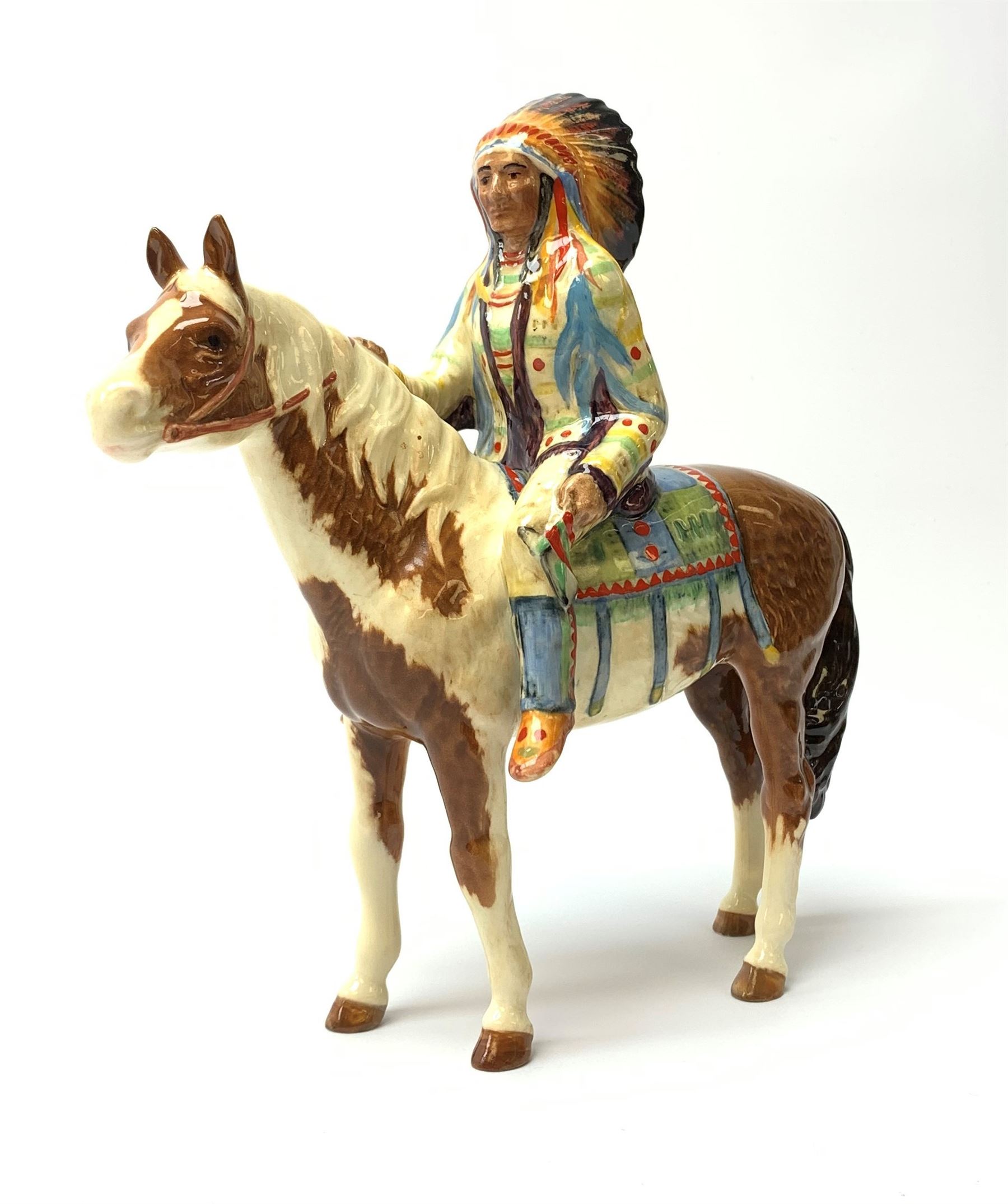 A Beswick Native American on horseback, with printed mark beneath, H21.5cm. 