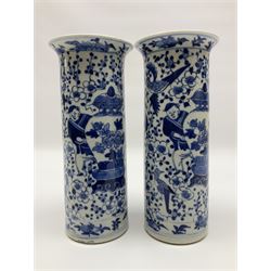 Pair of Chinese blue and white cylindrical vases, decorated with bird and flowers surrounding central figures holding a large vase, H20cm