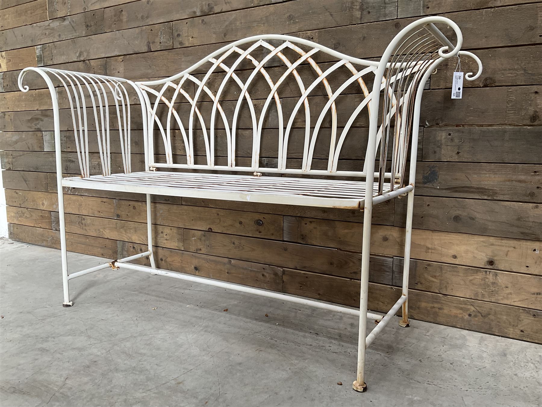 Two seat cream painted metal garden bench