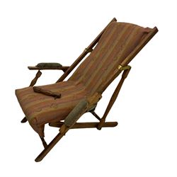 19th century teak campaign steamer or garden chair, folding staggered mechanism with brass fittings, upholstered seat, back and arms
