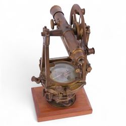 19th Century brass transit theodolite by Troughton & Simms, the sighting telescope with rack and pinion focusing above an inset compass, upon four levelling feet and a rectangular wooden base, including base H35.5cm