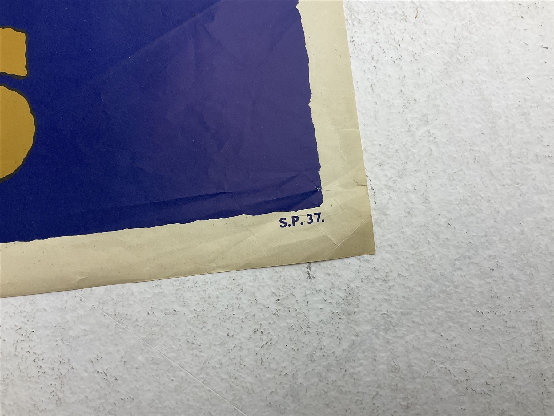 WW2 poster after Alfred Sindall printed for H.M. Stationery Office by Wm. Brown & Co Ltd London E.C.3; poster No.S.P.37 'Paper For Salvage Helps To Feed The Guns' depicting British Soldiers firing a field gun 75 x 51cm; blue, gold and white; unframed