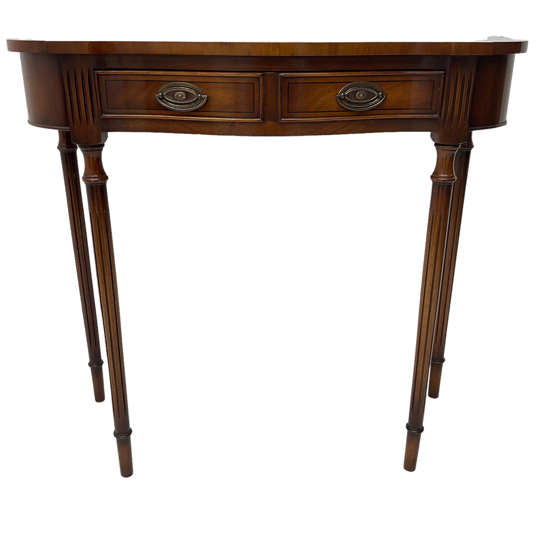 Regency design mahogany serpentine console table, fitted with single drawer disguised as two with cockbeaded facia, raised on fluted tapering supports