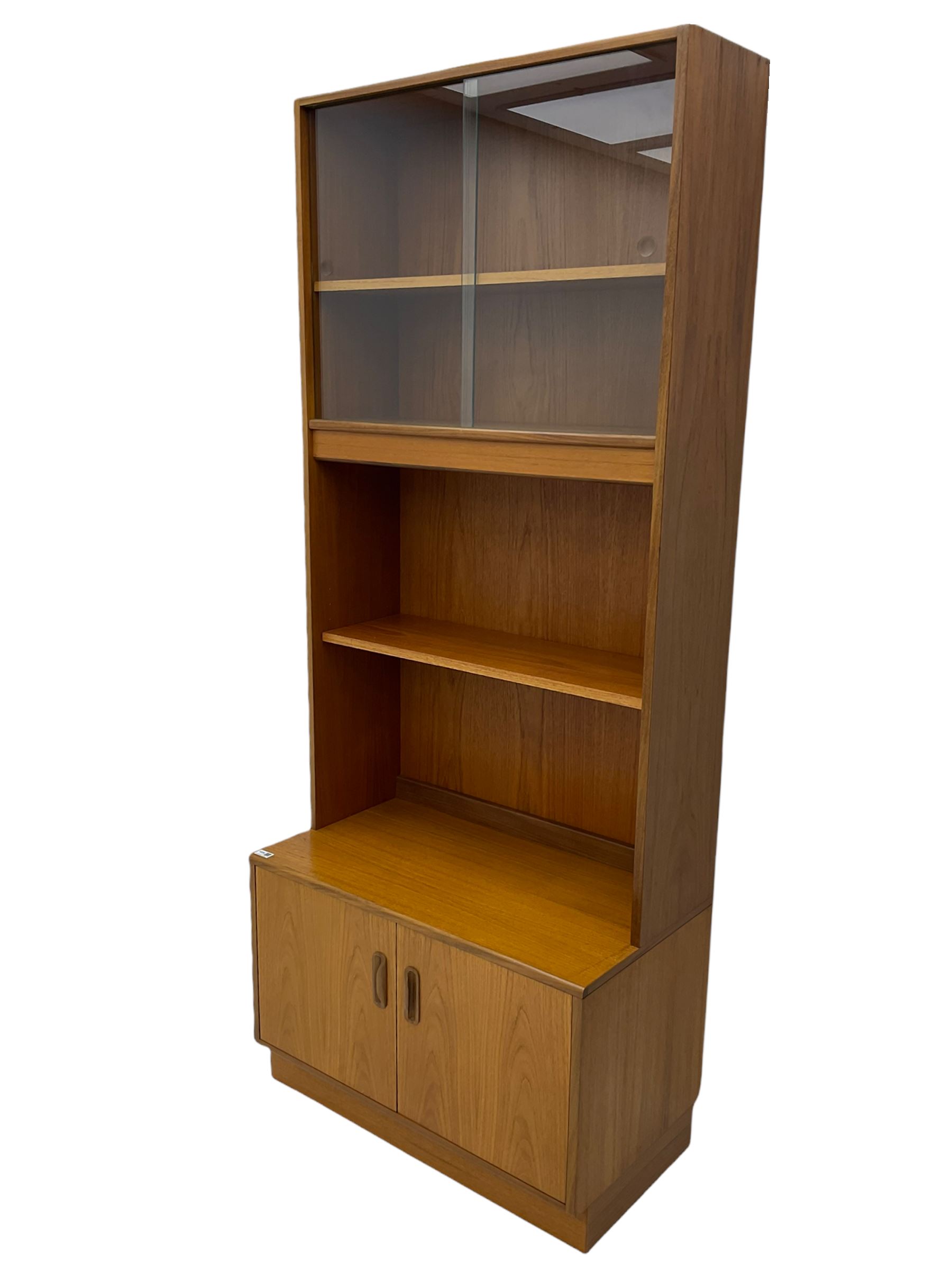 G-Plan teak two sectional modular wall display cabinet, fitted with sliding glass doors, double cupboard and three drawers