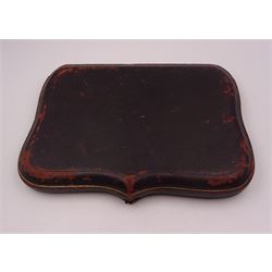 Set of ten Victorian silver coffee spoons, each with shaped scroll design rim, and a matching pair of sugar tongs, hallmarked Lee & Wigfull, Sheffield 1897, in tooled leather burgundy velvet and silk lined fitted case 