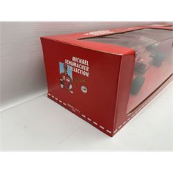 Four Paul's Model Art 1:18 scale Michael Schumacher Collection die-cast racing cars - Ferrari F310B; Ferrari F310/2; Benneton Renault B195; and Ferrari F300; all boxed (4)
