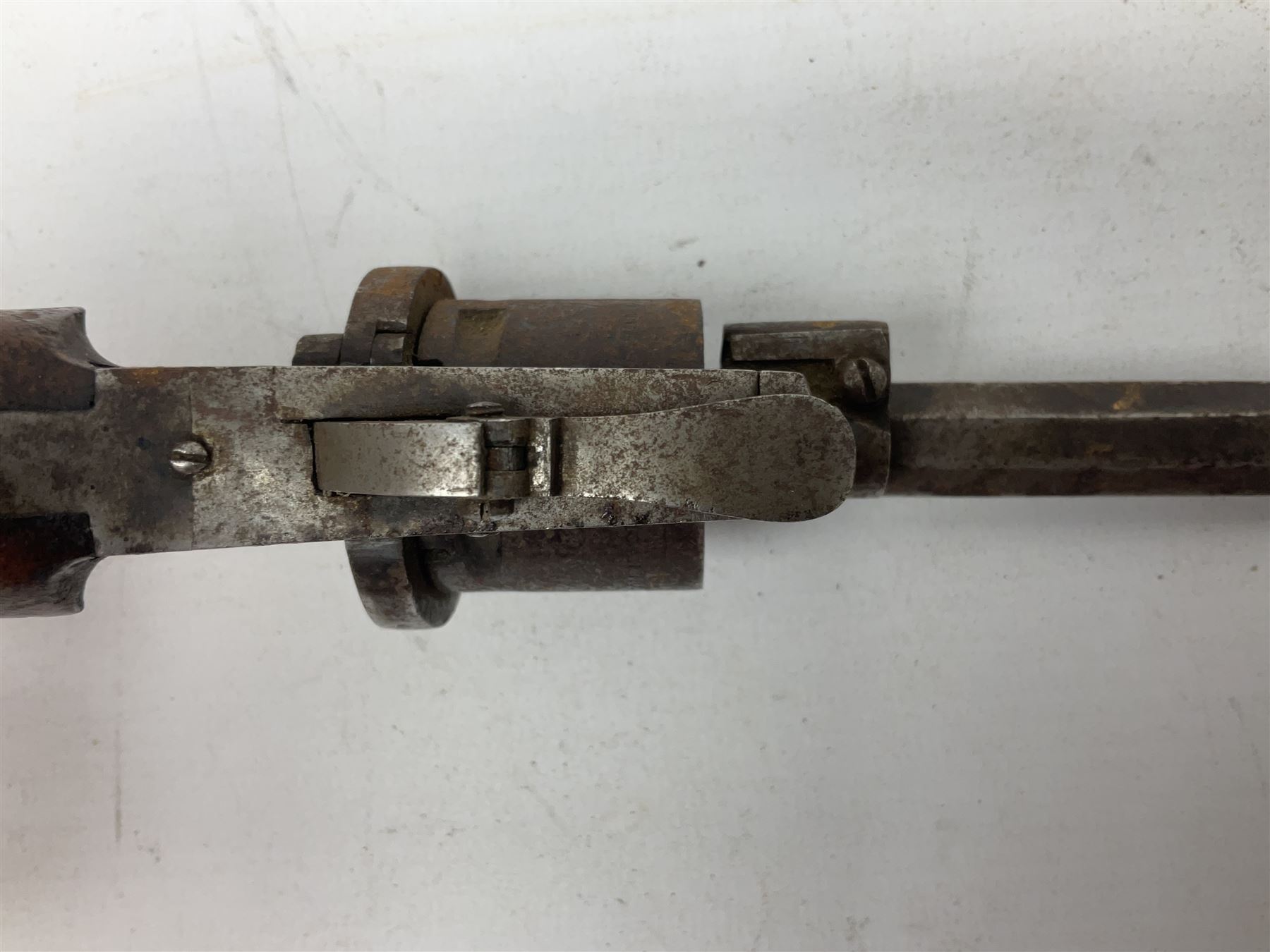 19th century 7mm five-shot pin-fire revolver, the cylinder marked 'The Savety (sic) American Revolver 1879', with folding trigger and two-piece walnut grip L18cm