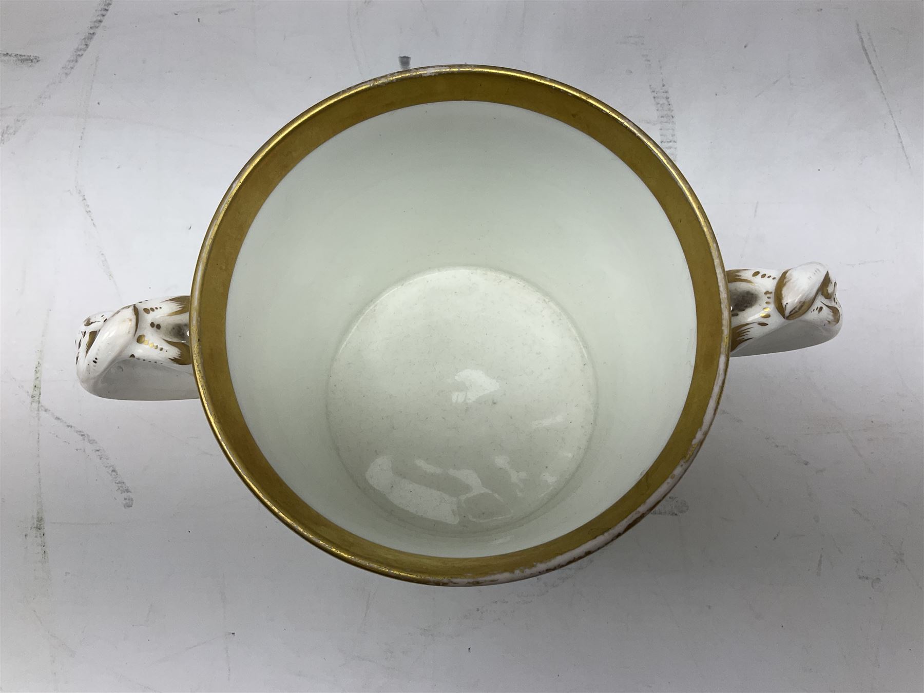 19th century loving cup, with decorated with religious iconography, a gilt rim and writing 'Henry Whittirld Wolverhampton, Whoever drinketh of the water shall thirst again but who soever drinketh of the water that i shall give him shall never thirst',  H14cm