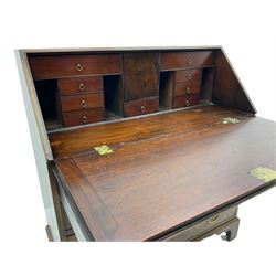 George III mahogany bureau, sloped fall front enclosing fitted interior, four long graduating drawers and two sliding stays, on bracket feet