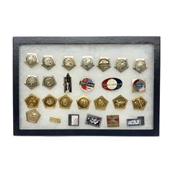 Twenty-six Russian Soviet Space badges 1960s/70s; in small display case