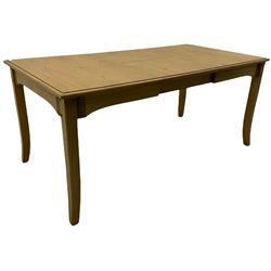 Windsor by Mark Devany oak rectangular extending dining table, with butterfly leaf, and four chairs with upholstered seats and backs