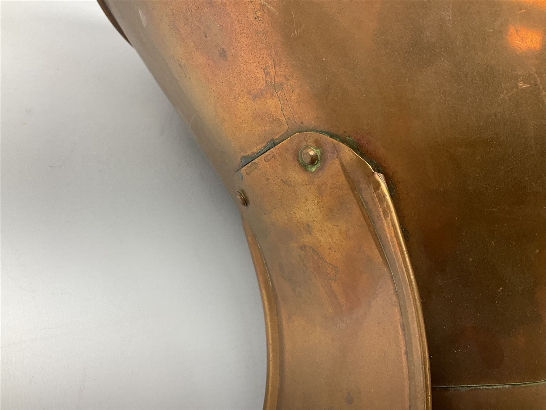 Agricultural copper corn funnel, H32.5cm, another similar copper funnel and copper warming platter of oval form, with twin handles on four supports, with removeable warming plate, L49cm