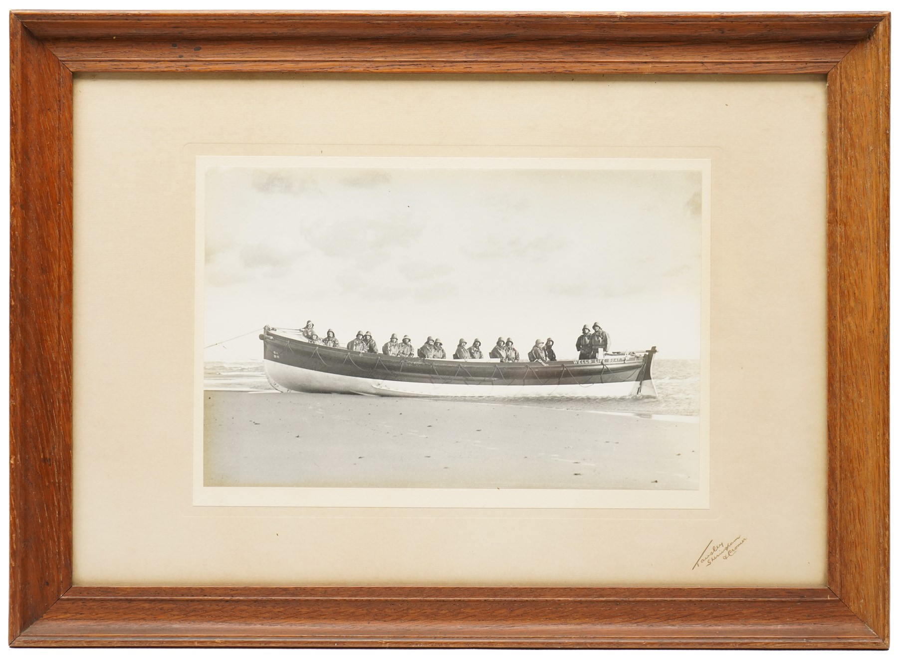 Joseph Eaman (British 1853-1907): Fisherman at Heavy Tides, watercolour signed 26cm x 41.5cm; After Frederick James Smyth (British fl.1841-1867): Stormy off Tynemouth Castle, hand-coloured engraving signed on the plate 24cm x 34cm; After Harry Hodges Tansley (British 1883-1961): Sheringham and Cromer, photographic print 18.5cm x 28.5cm (3)