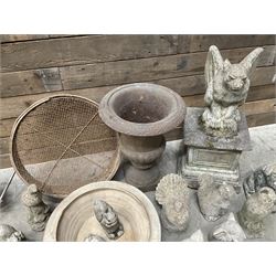 Small Victorian style cast iron urn, cast stone griffin on plinth, 13 garden figures, old vice and other items. 