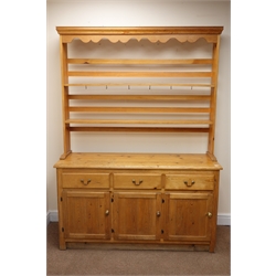  Solid pine dresser, raised back two tier plate rack above three drawers and cupboards, W138cm, H190cm, D45cm  