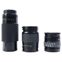 Minolta Dynax 3000i camera body, with three lenses including Sirius MC Auto Zoom 1:3.9 f=80-200mm, Minolta AF Zoom 80-200mm 1:4.5(22)-5.6 and Minolta AF Zoom 35-80mm 1:4(22)-5.6