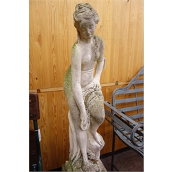  Composite garden statue of a part naked female, on square pedestal, H130cm  