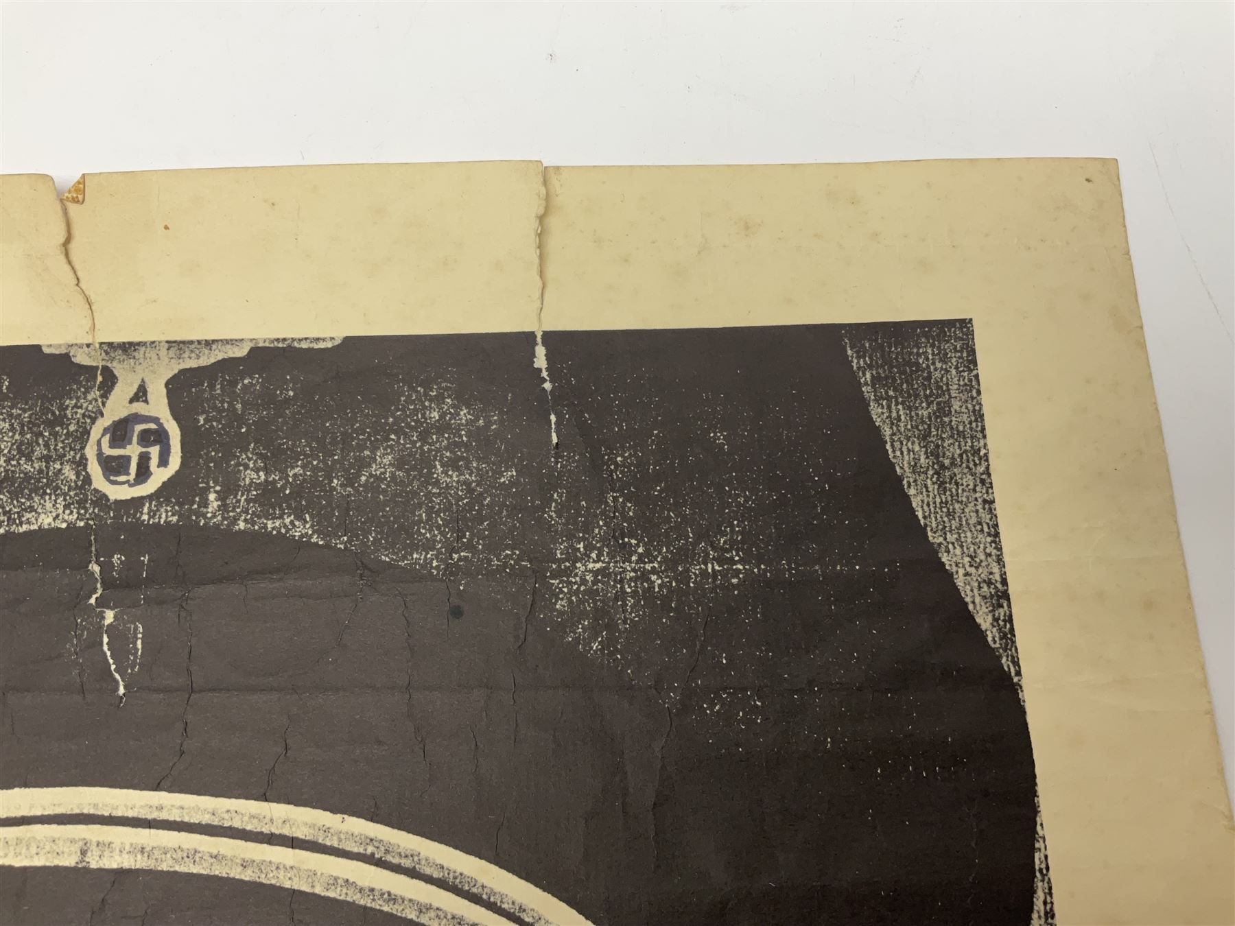 German monochrome 'Gestapo' poster, probably post-WW2, depicting the head of a grim faced Gestapo officer in uniform 55 x 42cm; unframed