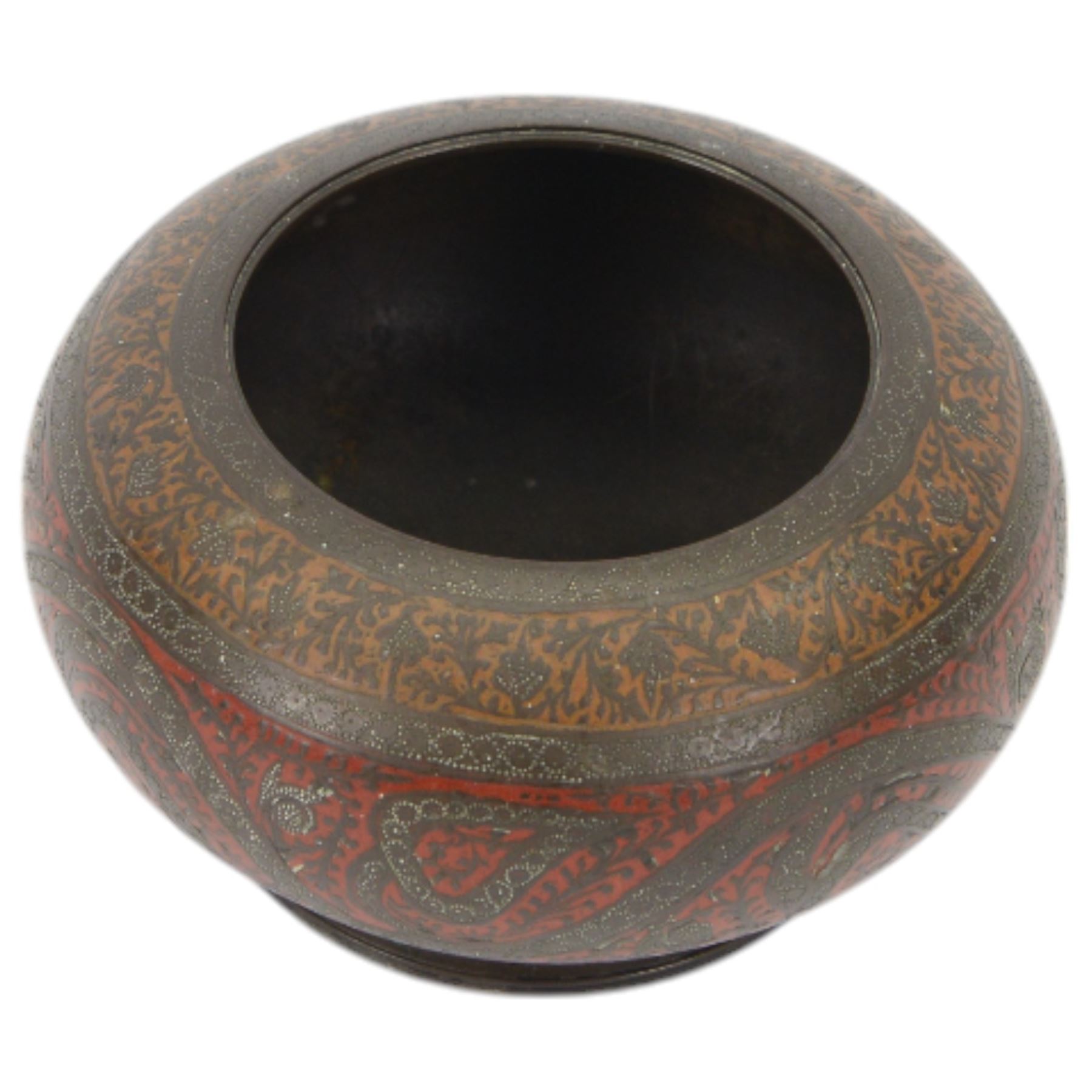 Indian bronze censor, decorated with stylised flowers upon a stepped circular base, H8cm