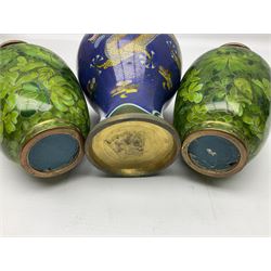 Three cloisonné vases, comprising pair of green and gilt examples with leafy foliage decoration and baluster example decorated with dragons chasing a flaming pearl upon blue ground, tallest H15cm