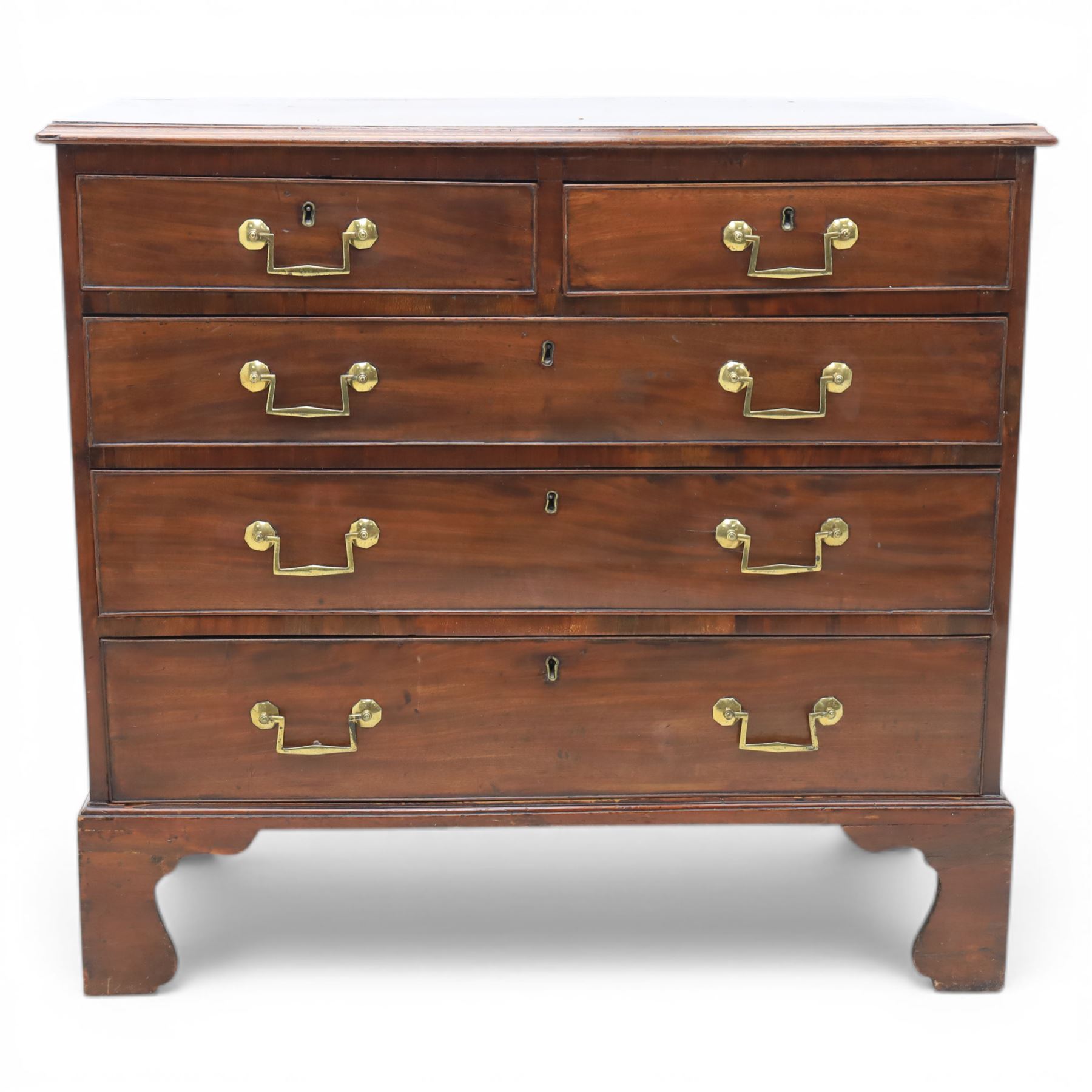 Small late Georgian mahogany chest, rectangular moulded top, above two short and three graduating long drawers, finished with square swan neck handles, raised on ogee bracket feet 
