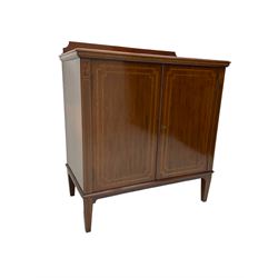 Edwardian inlaid mahogany side cabinet, raised back, the edge inlaid with chequerboard satinwood decoration, two panelled cupboards with banding and ebony stringing enclosing single shelf over four dividers