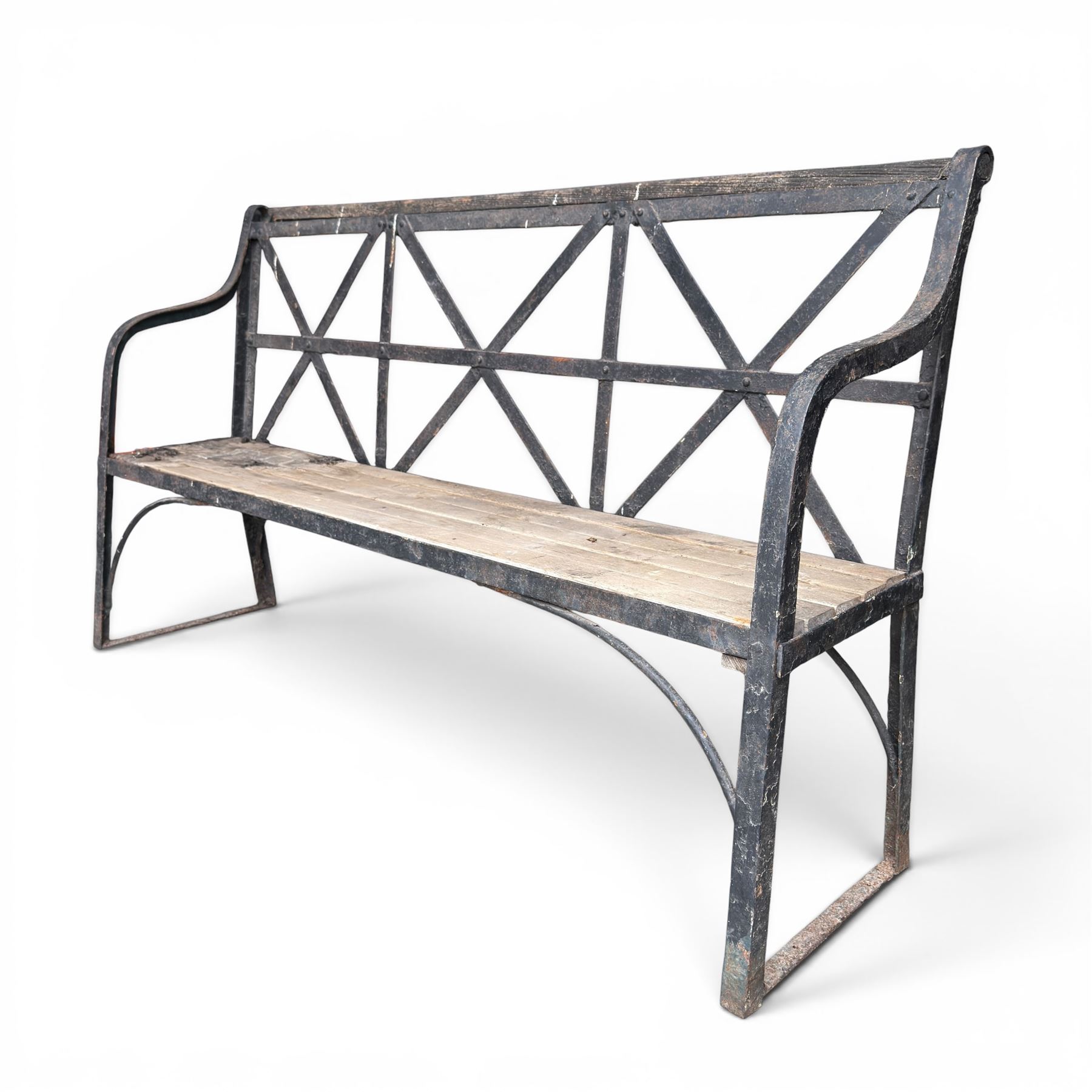 19th century and later Estate made wrought iron strapwork garden bench, the weathered wooden cresting rail over X-form strapwork back and slatted wooden seat