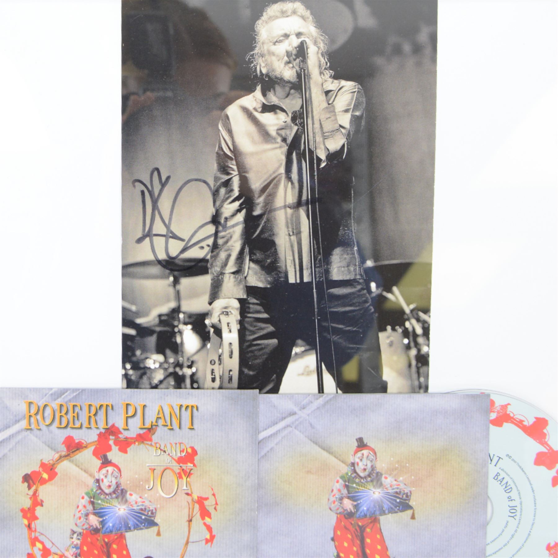 Robert Plant memorabilia, including framed and signed photograph and Band of Joy CD, Higher Rock CD and a Mojo magazine with Plant on the cover