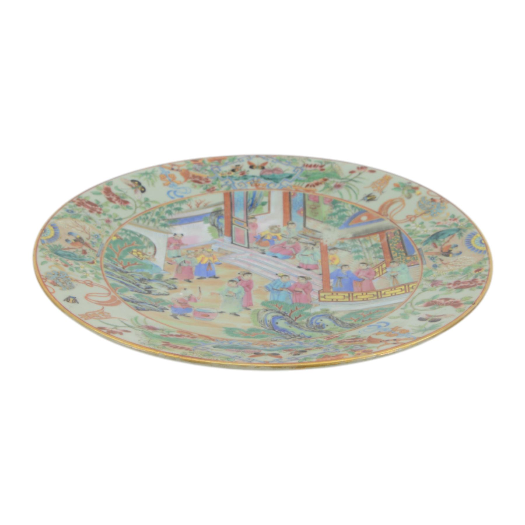 19th century Chinese Canton export celadon ground famille rose charger, of circular dished form decorated with a central panel of figures in a court setting, within a border of blossoms, birds and butterflies, D34.5cm