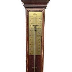20th century - Replica mercury wall mounted stick barometer, fully glazed case with a gilt register measuring air pressure in inches, adjustable vernier and recording pointer, with a conforming thermometer  recording the temperature in degrees Fahrenheit and Celsius.  