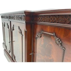 Wade Georgian style mahogany break front sideboard, fitted with four drawers and four cupboards