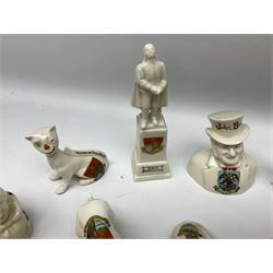 Collection of figural crested ware, to include Carlton Chins John Bull Alnwick, Clifton China Cheshire Cat,  Arcadia pig, Crafton crawling baby and another seated baby, quantity of cat, dog and pig figures, two Willow Art Model of Bunyans Statue, Toby jug, Victoria China, Arcadan bulldog, fish etc