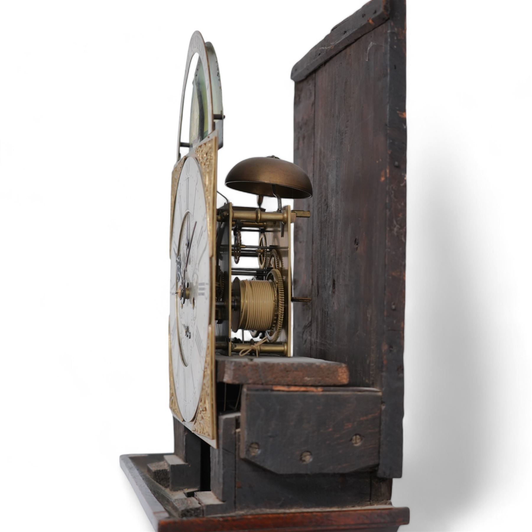 Benjamin Booth of Pontefract - 8-day oak longcase clock c1790. with a stepped broken arched pediment, deep cornice with dog tooth moulding and two brass finials, break arch hood door with flanking reeded pilasters and gesso capitals, trunk with canted corners and a long break arch topped door, on a rectangular plinth with applied skirting, brass dial with rocking ship automata and makers name to to the arch, with bordered cast spandrels and an silvered engraved dial centre, chapter with Roman numerals and five minute Arabic's, matching steel hands , calendar and seconds dials, movement pinned to a rack striking movement with a recoil anchor escapement. With weights, pendulum and key.
Benjamin Booth is recorded as being apprenticed to John Booth of Huddersfield in 1760 and working in Pontefract c1766 until his death in 1806. 