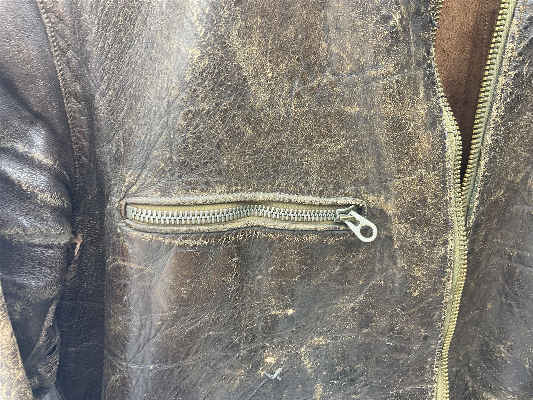 German Luftwaffe Hartmann leather jacket with tartan pocket linings, pocket zip pulls marked 'Eclair Bte.S.G.D.G.'