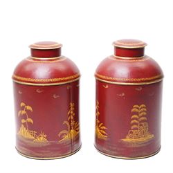 Pair of red toleware style tea cannisters, painted with fishermen, H36cm 