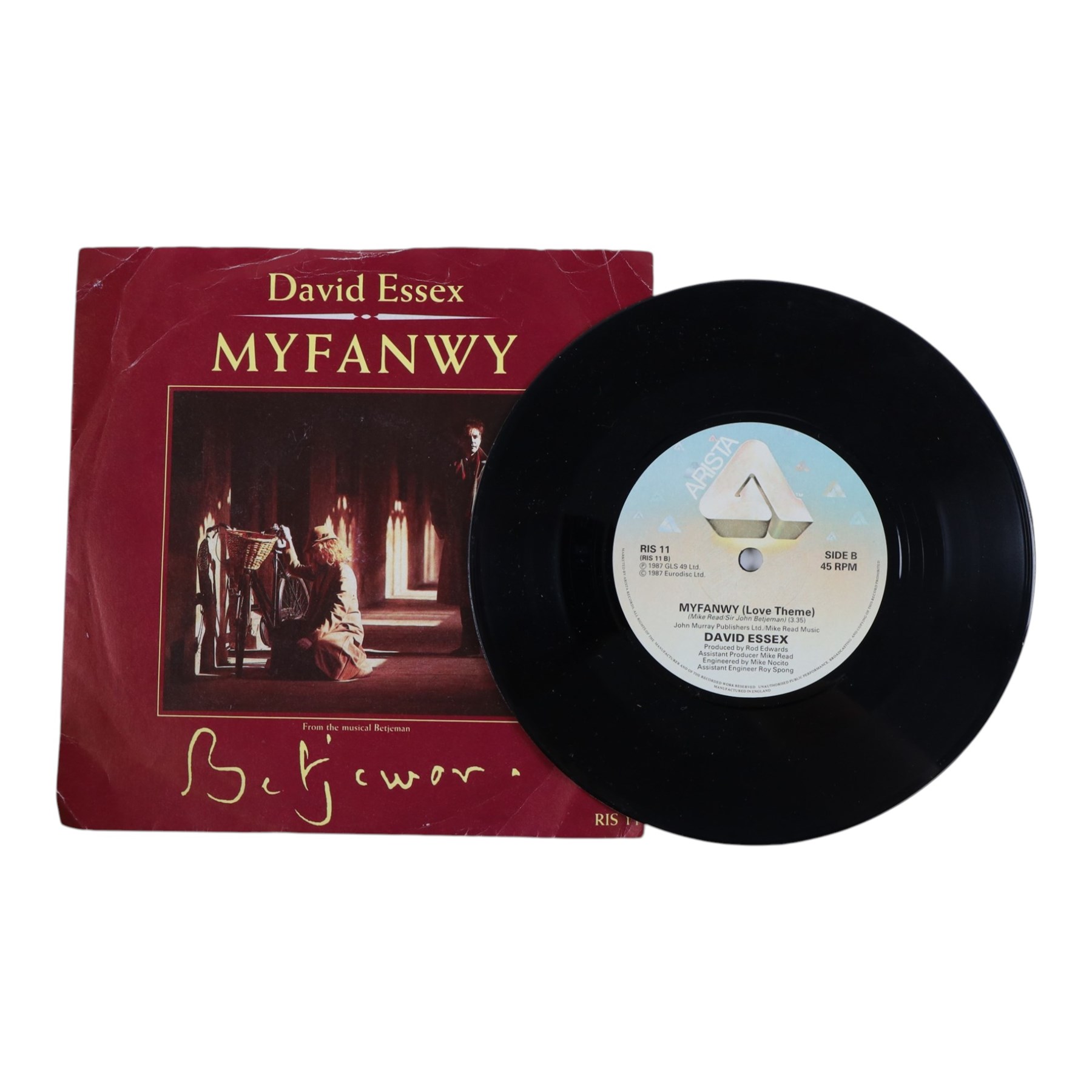 Collection of John Betjeman books and memorabilia, to include first edition 'Summoned by the Bells' hardback, framed autograph of Betjeman, vinyl of 'Myfanwy' poem and three other books
