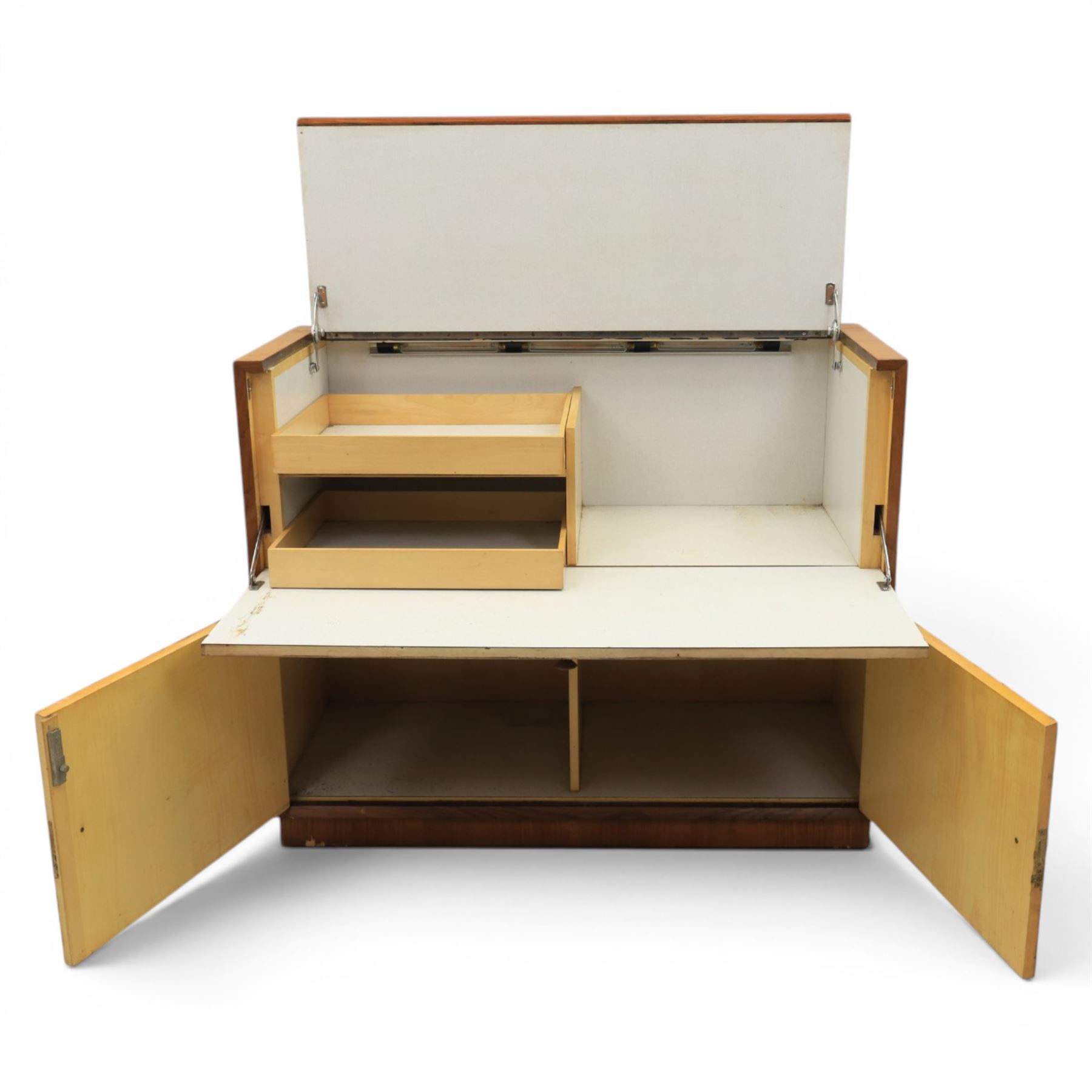 Teak mid 20th century fall front cabinet, hinged top with geometric inlay front, above twin cabinet doors