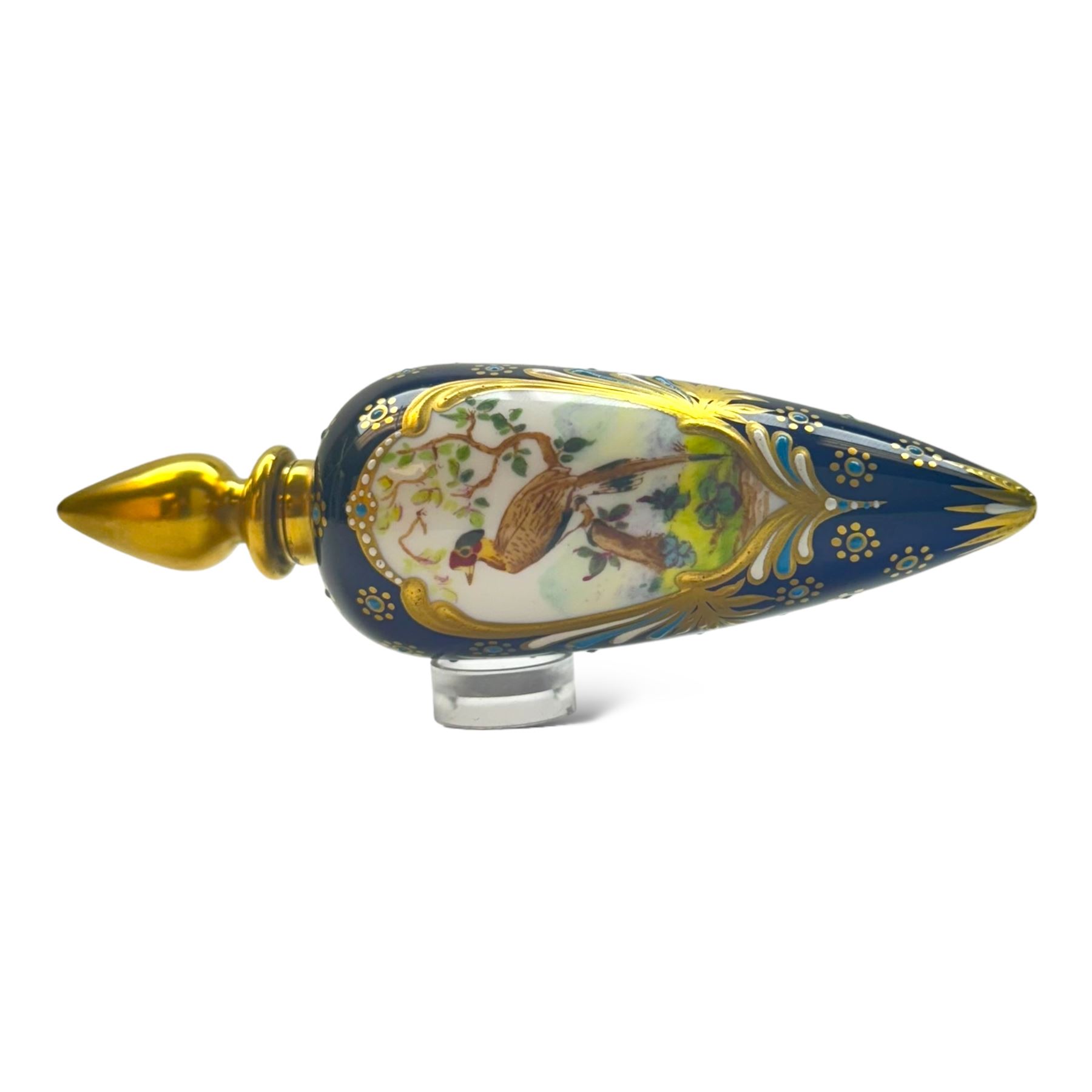19th century english scent bottle of teardrop form, hand painted with a central panel depicting an exotic bird, with a cobalt blue ground, H12cm 