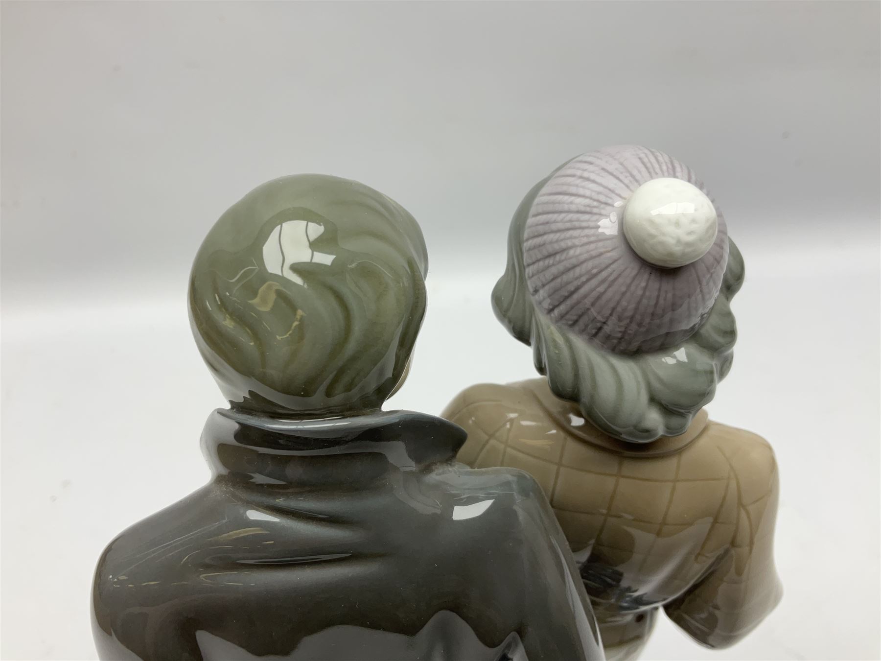 Lladro figure, Sad Parting, modelled as a man and woman with suitcases, sculpted by Francisco Catalá, with original box, no 5583, year issued 1989, year retired 1991, H33cm