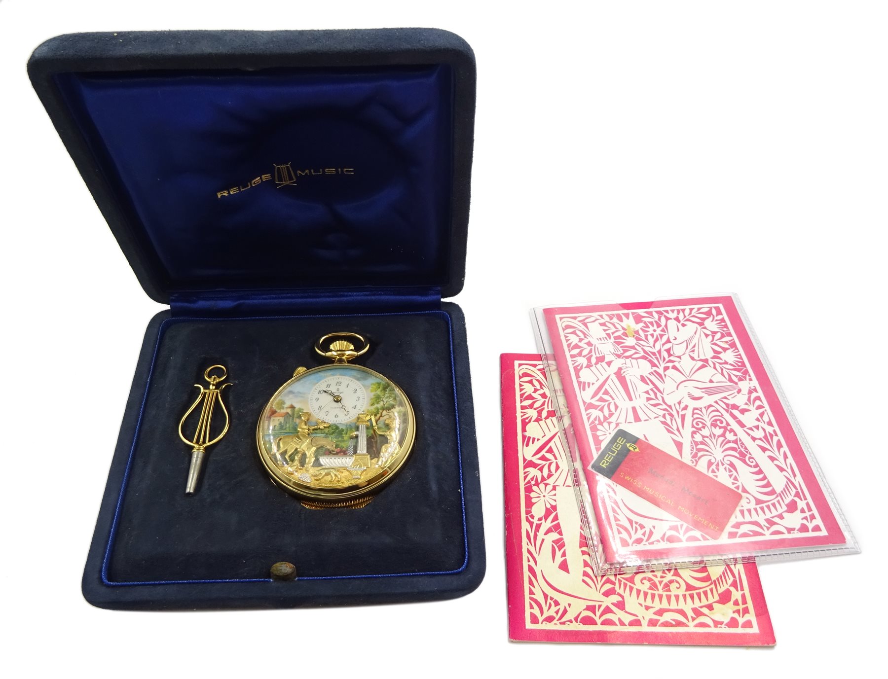 Charles Reuge Saint-Croix musical automaton alarm pocket watch, cylinder movement, alarm hand, printed landscape scene with depicting a lady beside a water pump and a figure on a horse, No. 3307, wide, with fitted box, winding key and booklet 