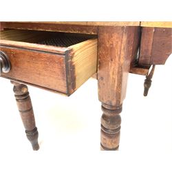 Victorian stained and polished pine drop leaf kitchen table, single drawer either end, turned supports