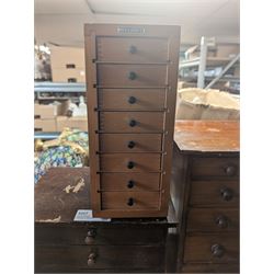 Three table top cabinets, containing various miscellaneous items including pens, scissors, scientific glass tubes, stationary items etc, the largest measuring H45cm, W38.5, D23.5cm