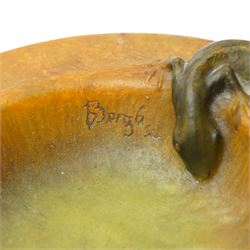 Amalric Walter (1870-1959) and Henri Berge (1868-1936), Nancy, France, circa 1920, pate de verre, Salamander ashtray, bearing moulded mark 'A Walter Nancy' and incised mark 'Berge sc.', D12cm

Note: Almaric Walter, born in Sèvres near Paris, exhibited at the Salon des Artistes Françaises in 1895 and 1903, and in 1908 moved to Nancy where he established his own workshop within the Daum glassworks. There he worked closely with Daum designers, including Henri Bergé. This ashtray is an example of Walter’s pâte-de-verre technique.

Provenance: From the collection of Andrew Chichester Everitt.