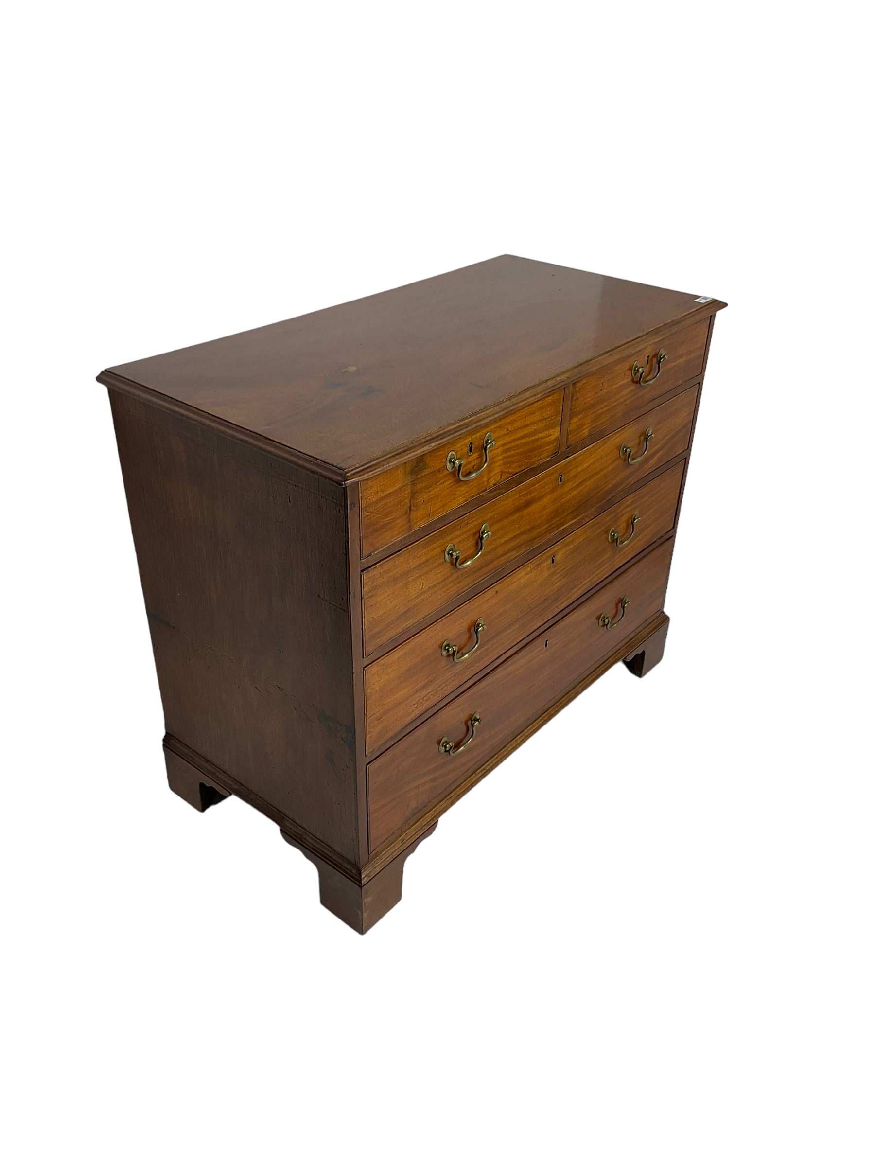 George III mahogany straight-front chest, fitted with two short over three long drawers, on bracket feet