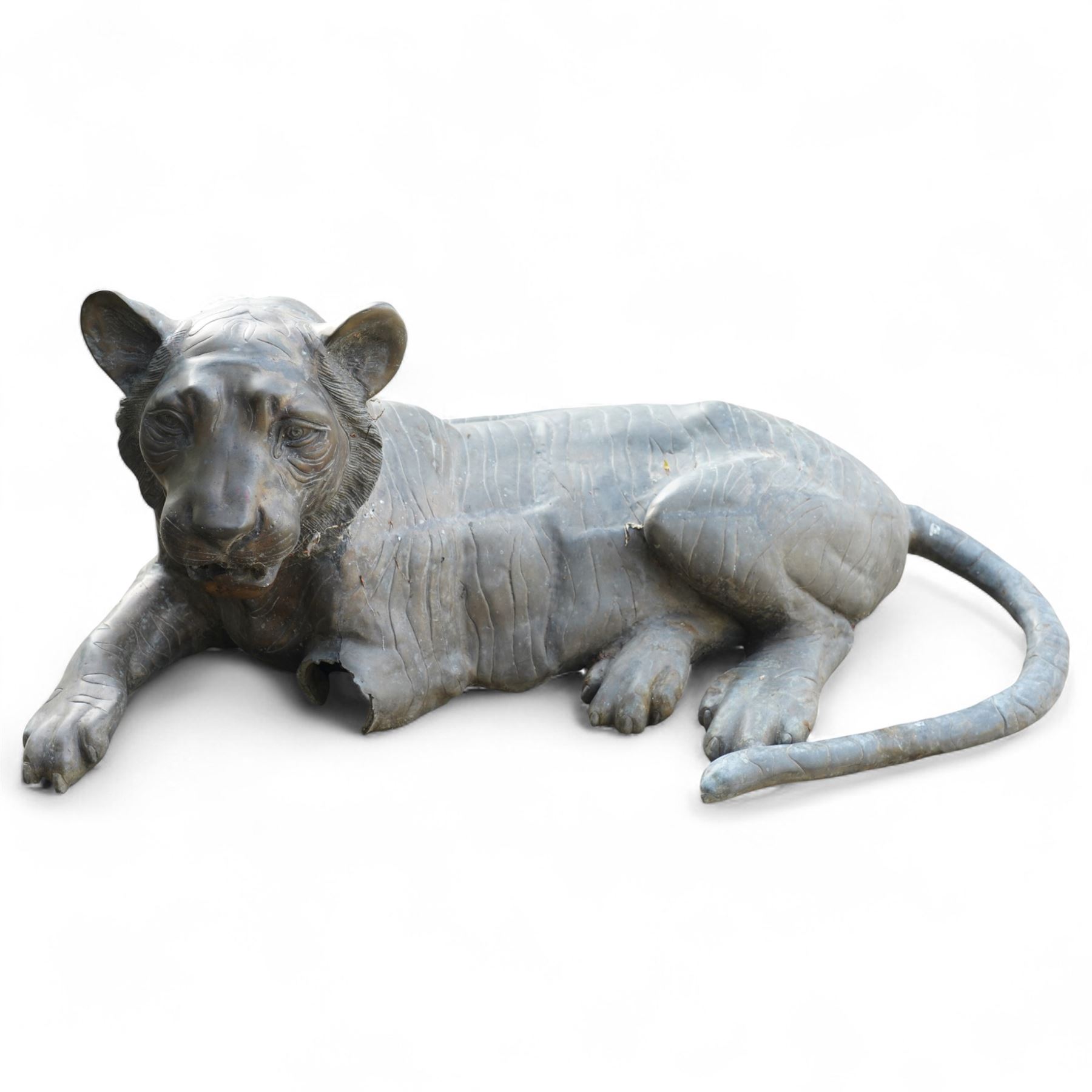 Pair of Chinese cast bronze tiger figures, one in a seated resting pose and the other advancing with open mouth, both with incised striping and aged bronze patina
Seated tiger (H 54cm, W 63cm, L 129cm)
Stood tiger (H 76cm, W 40cm, L 176cm) 