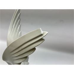 1930s Meissen figure of a seagull designed by Max Esser, modelled upon the crest of a wave with wings spread above its body, upon black square base, with blue cross swords mark, H43cm