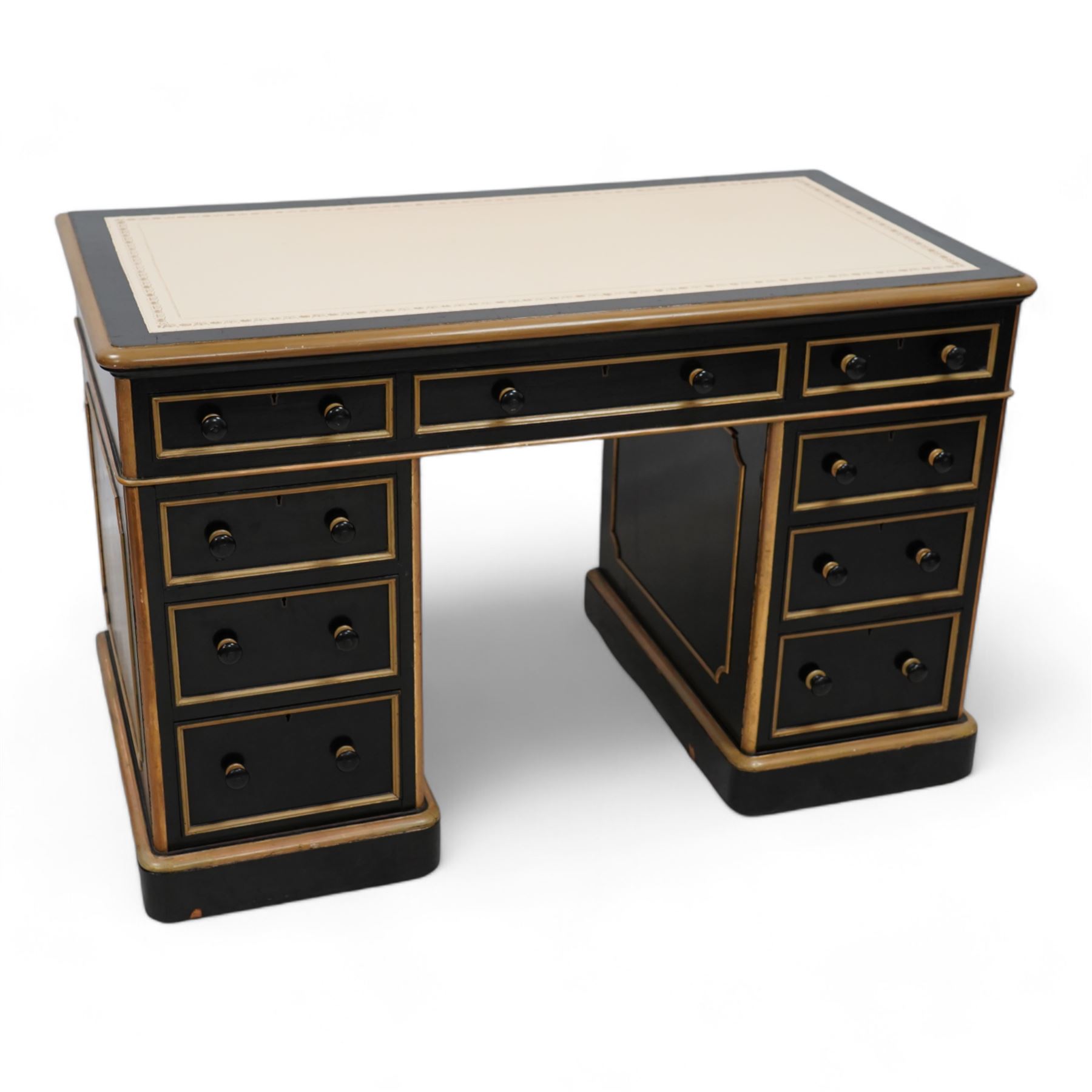 J. Maple & Co. (London: 1841-1988) - Victorian black painted and parcel gilt twin pedestal desk, moulded rectangular top with rounded corners and cream leather writing surface, fitted with nine drawers, on moulded plinth base, stamped 'J. Maple & Son' 