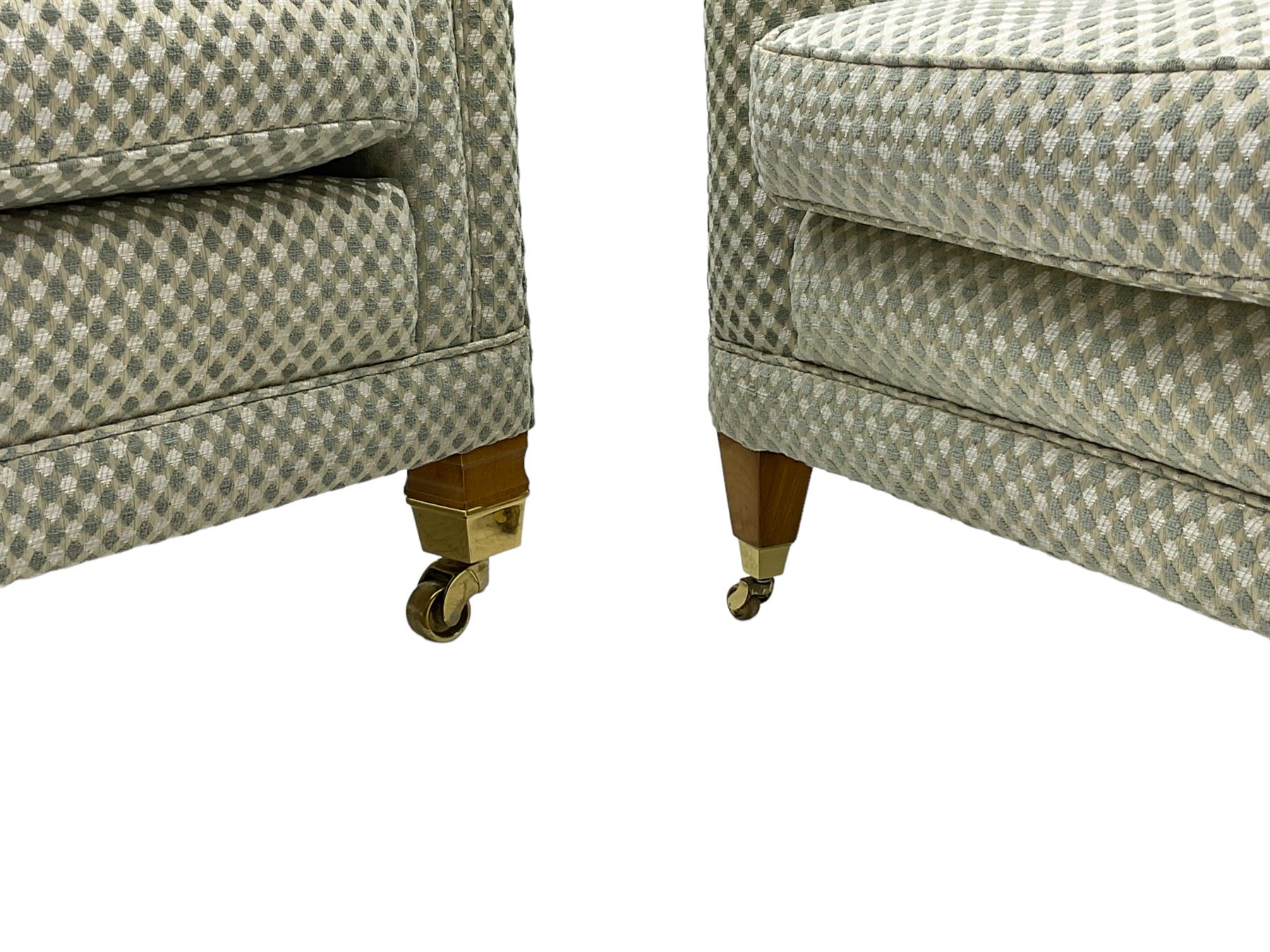 Three-piece hardwood-framed lounge suite - large two-seat Knole sofa with drop ends, upholstered in patterned fabric decorated with urns and foliage (W190cm, D117cm, H88cm); armchair upholstered in contrasting geometric pattern fabric (W83cm, D102cm, H93cm); and another armchair (W82cm, D102cm, H92cm) (3)